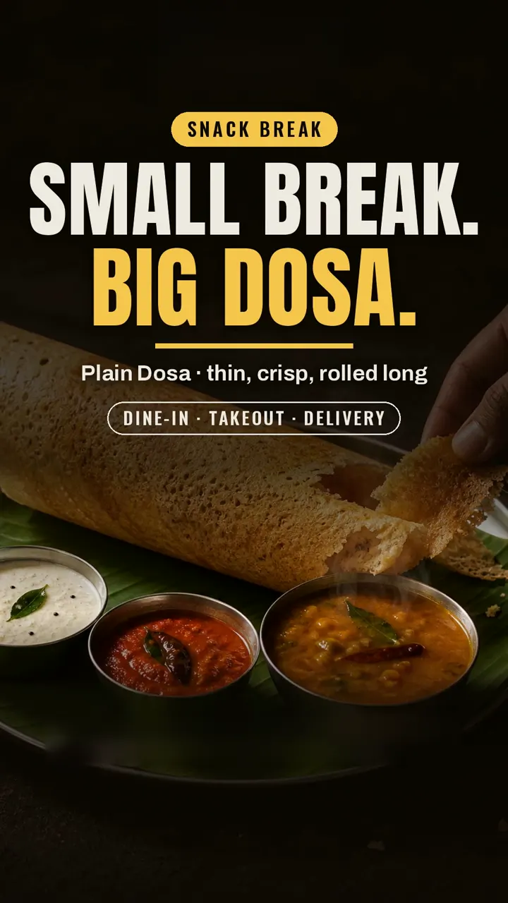 Snack break: a plain dosa, thin, crisp and rolled long, with chutneys and sambar.